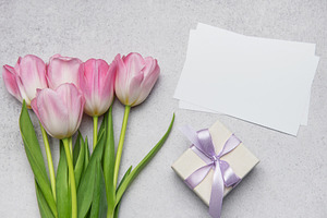 Pink tulips bouquet, gift box and blank cards creating festive c, a Holiday Photo by Olena Rudo