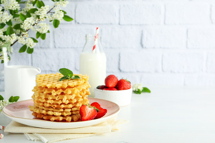 Concept of tasty food with wafers, space for text, a Food & Drink Photo by AtlasStudio