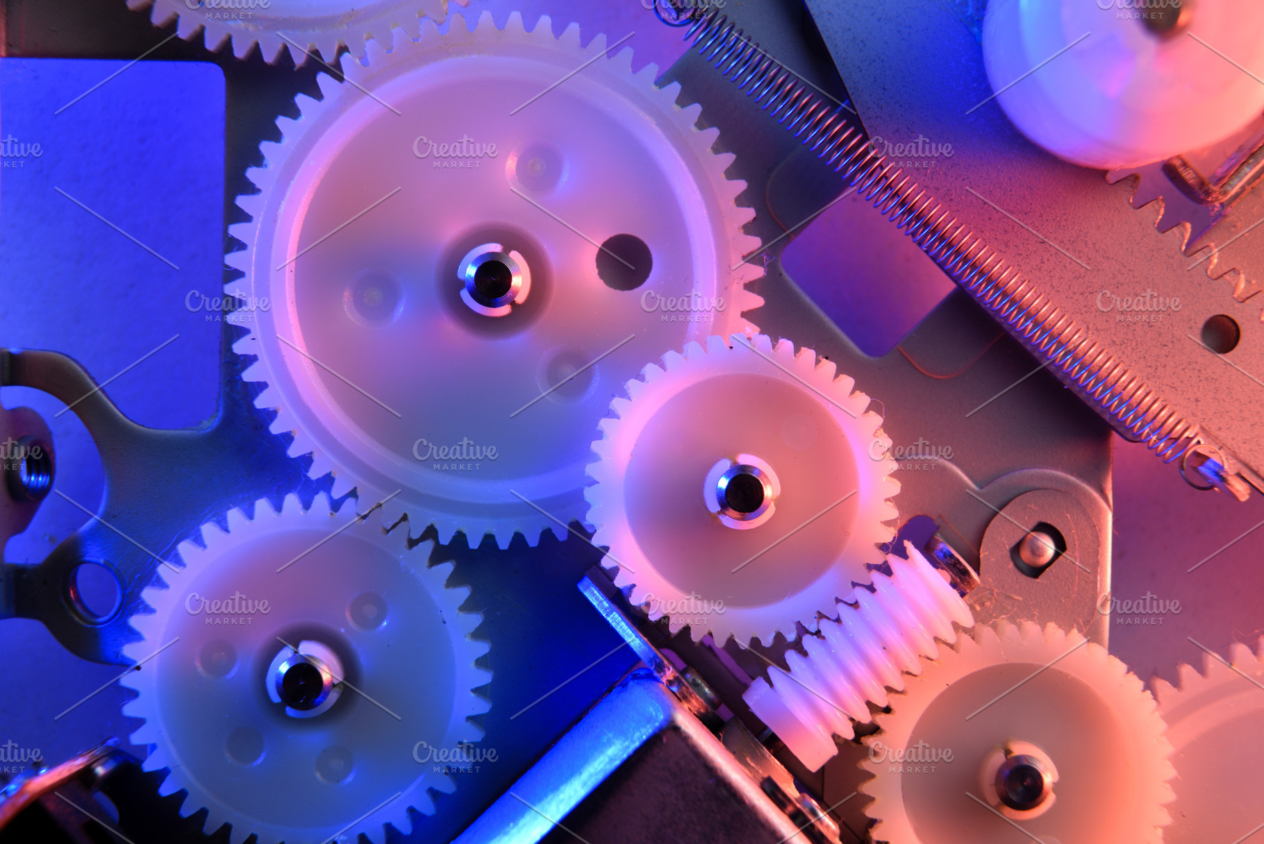 Colorful Plastic Gears with Neon Lighting, a Technology Photo by Davizro's Market