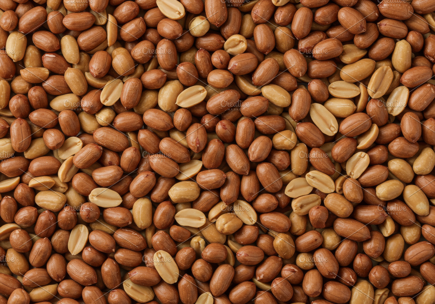 Raw and halved shelled peanuts formi, a Food & Drink Photo by professorinc
