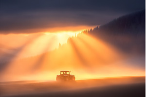 Tractor drives through stunning, a Nature Photo by Lermont51