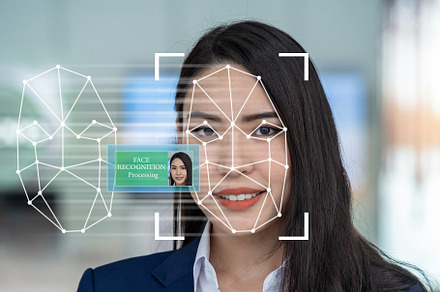 Asian women using Face detection and, a Technology Photo by Tzido Gallery