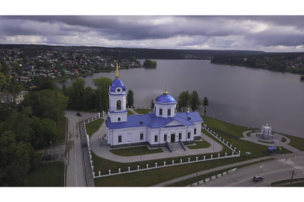 Top view of monastery by river bank, a Nature Photo by Media Whale Stock