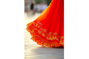 Flowing Red Gown Hem with Floral, a Background Photo by Lermont51