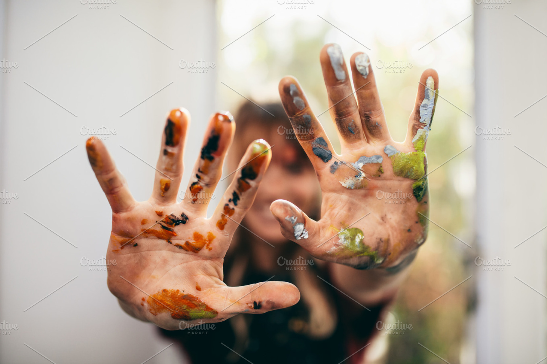 Artist showing her messy hands, an Arts & Entertainment Photo by Jacob Lund