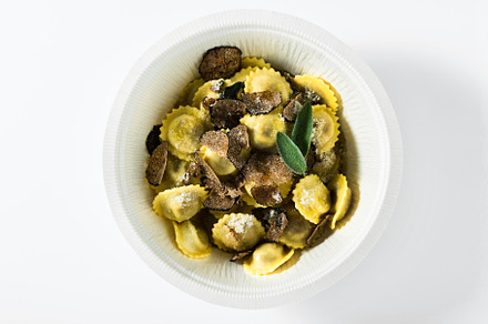 Italian ravioli with butter, parmesan cheese and truffle on the