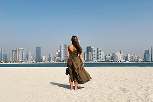 Back view of young female in dress, a Person Photo by Artem Varnitsin