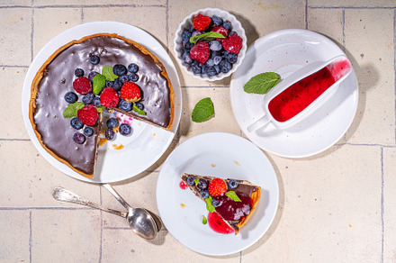 Homemade cheesecake with chocolate and berry, a Food & Drink Photo by Rimma