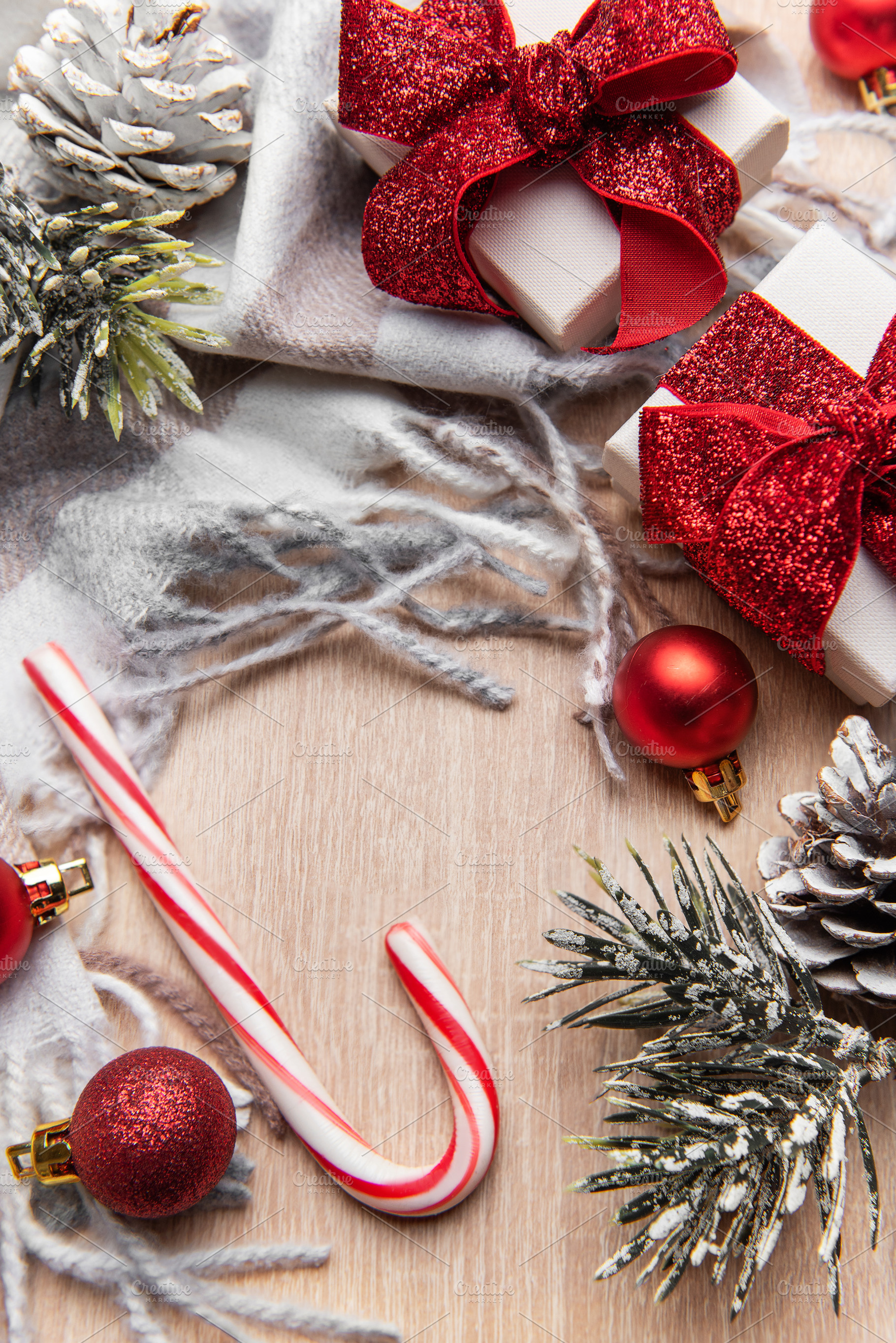Christmas gifts and candy cane on cozy shawl, a Holiday Photo by Olena Rudo
