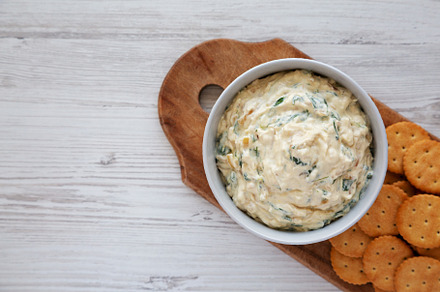 Homemade Caramelized Onion and Spinach Dip with Salty Round Crac, a Food & Drink Photo by LiudmylaChuhunova
