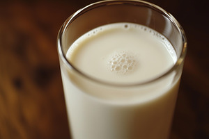 Milk in a glass on wooden background, a Food & Drink Photo by MistyDay