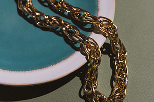 Vintage gold chain displayed in a ce, a Beauty & Fashion Photo by Edalin's Store