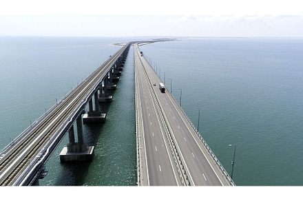 Aerial view of a bridge over the sea, an Architecture Photo by Media Whale Stock