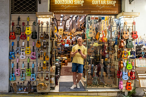 Guitar shop entrance and display, an Arts & Entertainment Photo by BOOCYS