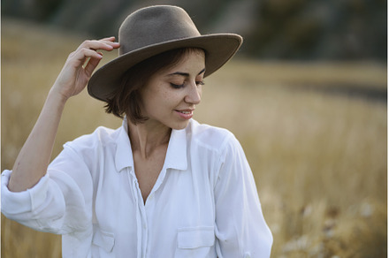 Beautiful woman in hat posing in, a Person Photo by vitaliymateha photography