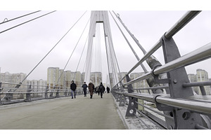People walking on modern cable, an Architecture Photo by Media Whale Stock
