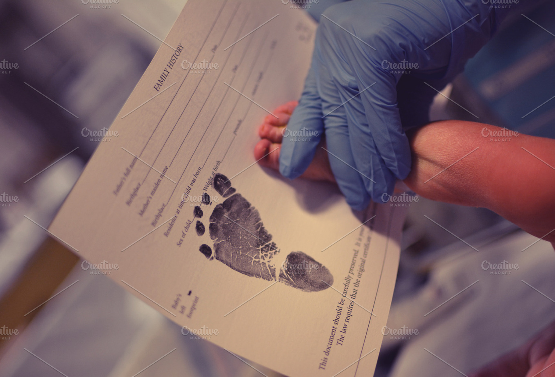 Birth announcement stock photo containing baby and foot