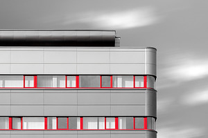 Modern building with red windows, an Architecture Photo by BOOCYS