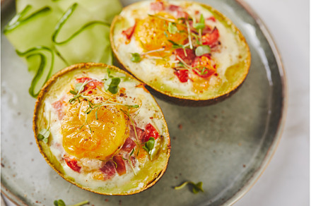 Avocado baked with egg, ham