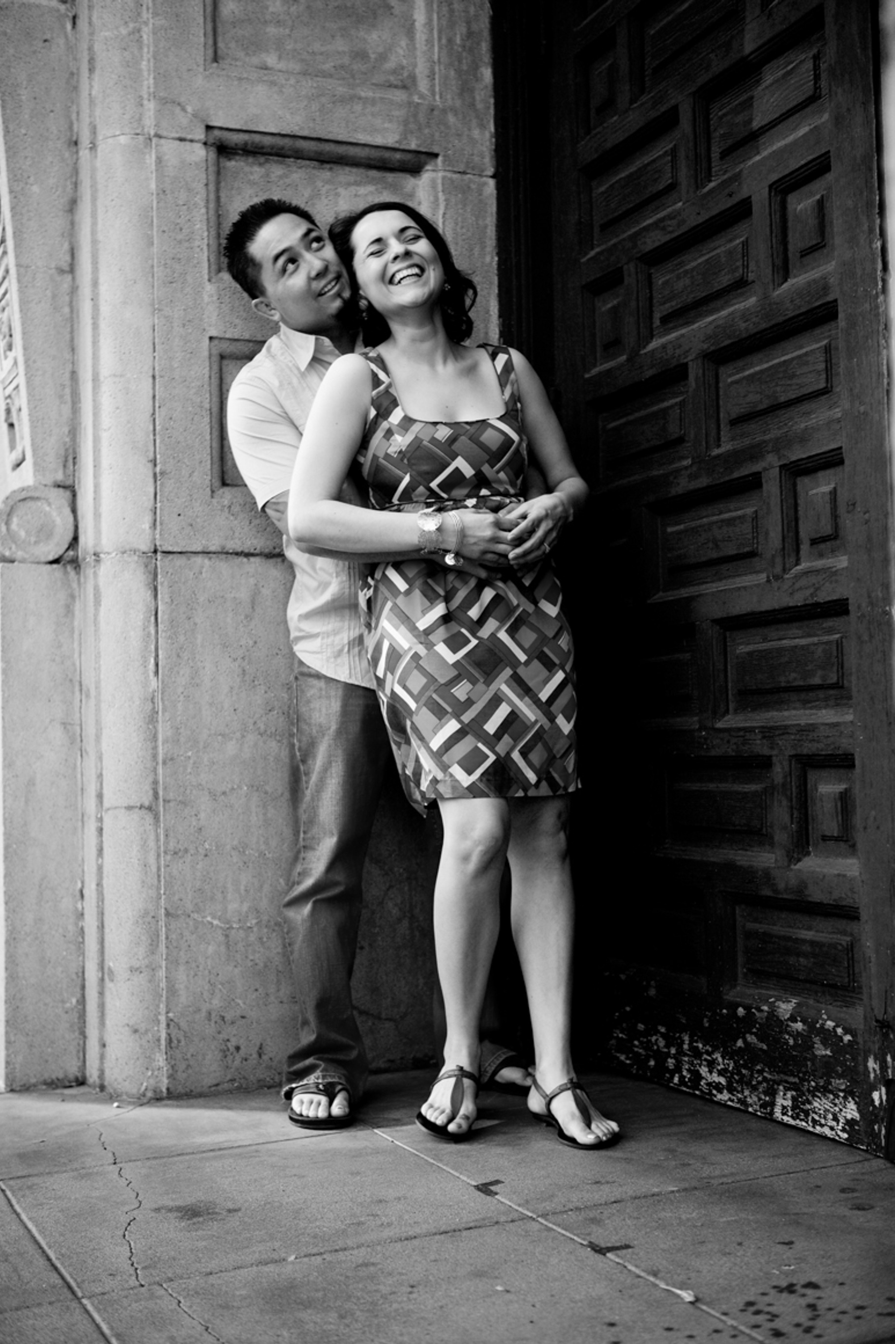 Engagement Couple In Doorway Bw