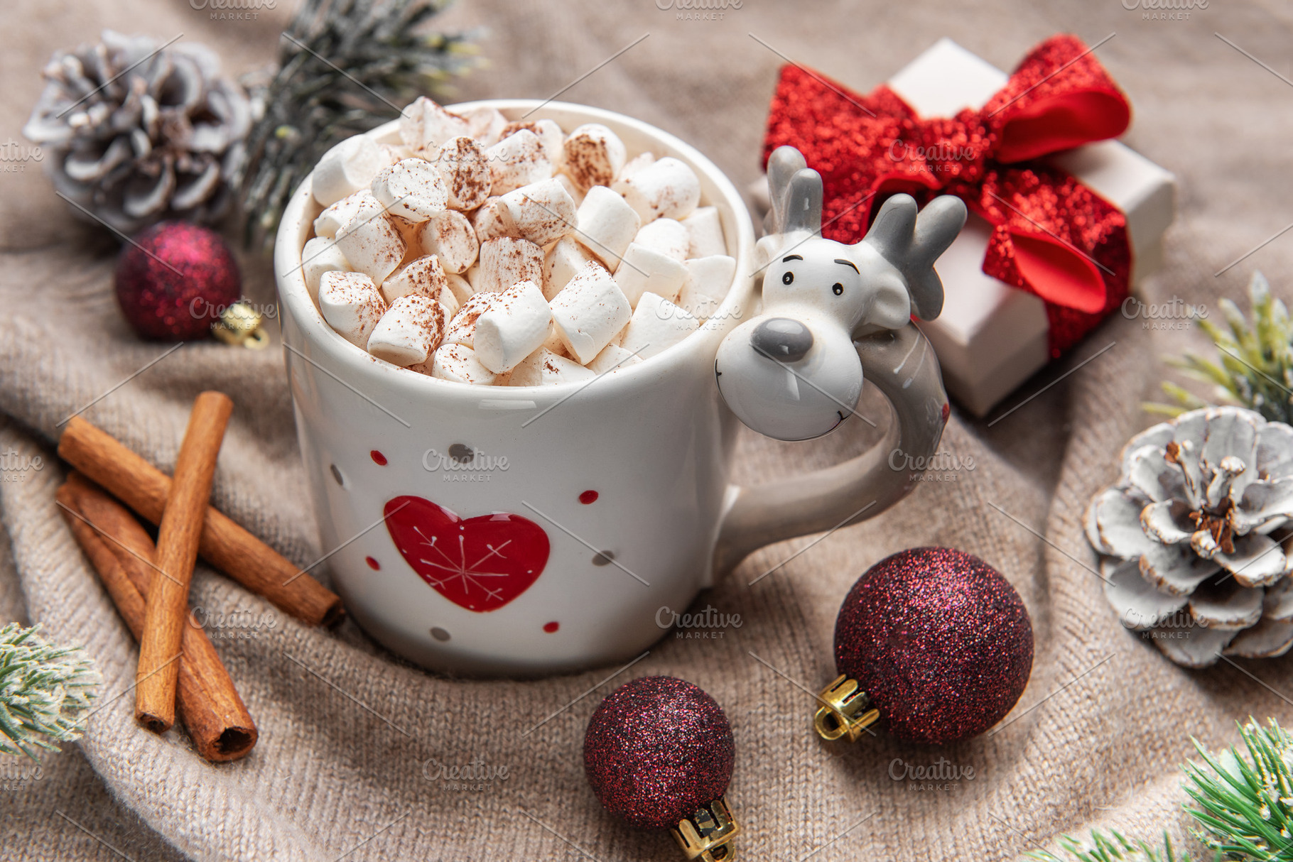 Cozy christmas hot chocolate with marshmallows and reindeer mug, a Holiday Photo by Olena Rudo