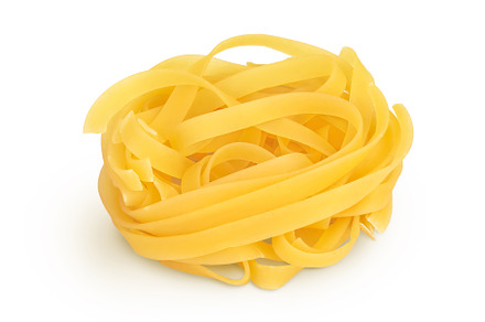 Raw tagliatelle pasta isolated on, a Food & Drink Photo by NataPhoto
