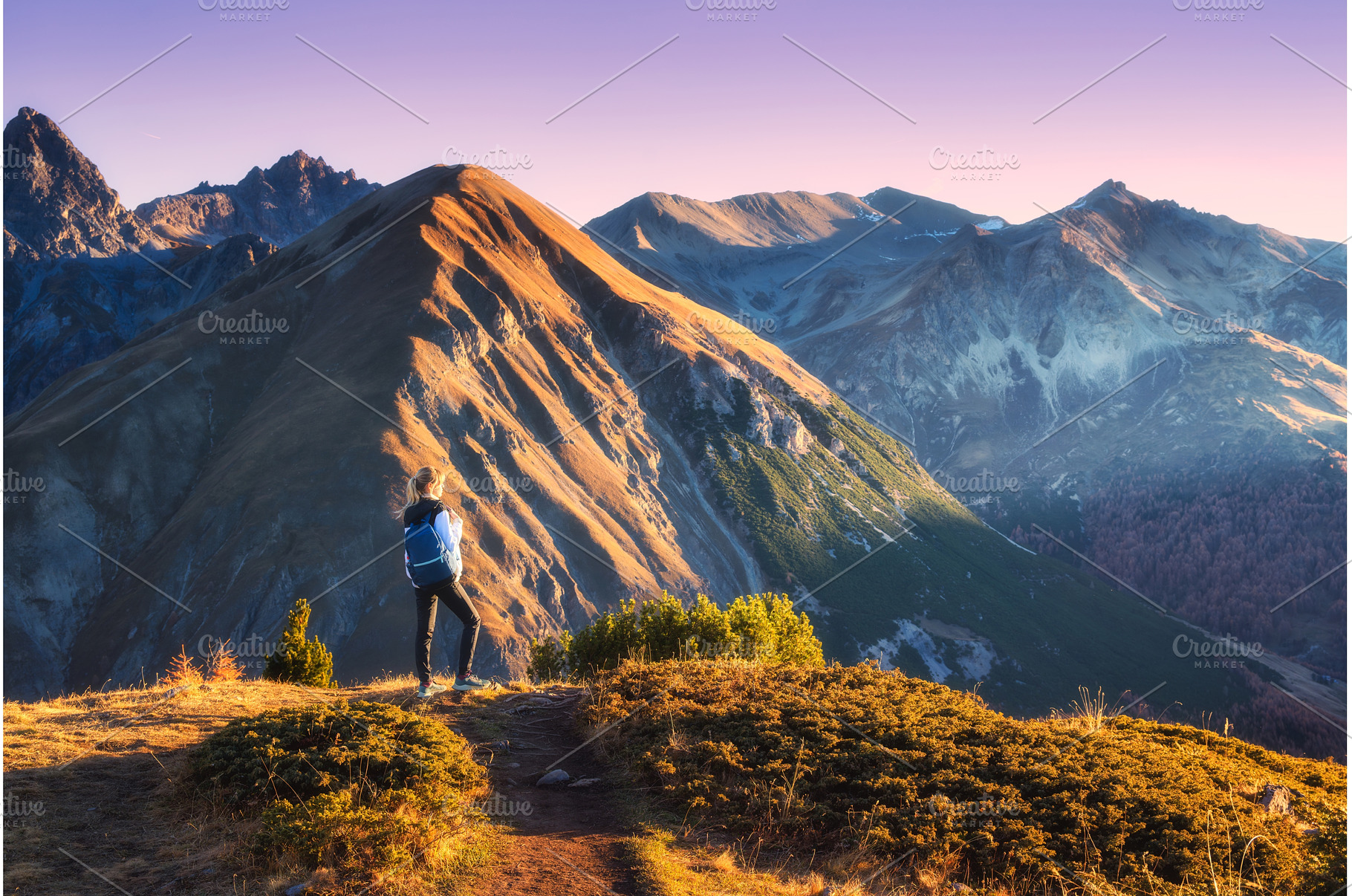 Young woman with backpack standing, a Person Photo by den-belitsky