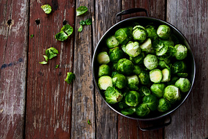 Fresh brussel sprouts featuring sprout, brussels, and green