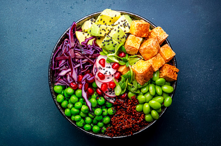 Vegan buddha bowl with red quinoa, fried tofu, avocado, edamame, a Food & Drink Photo by 5PH