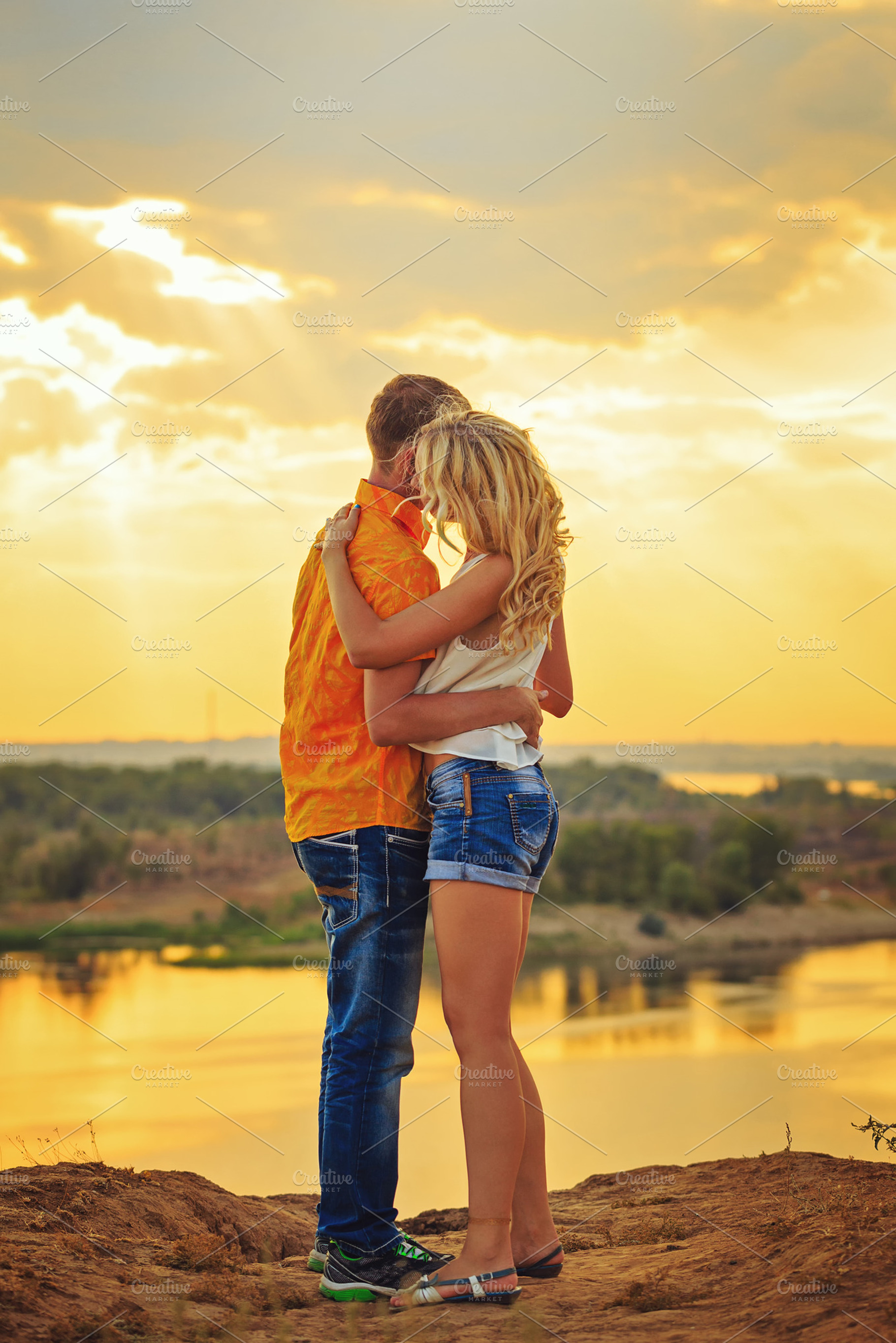 Loving couple embracing at sunset, a Person Photo by Elena Vagengeim ...