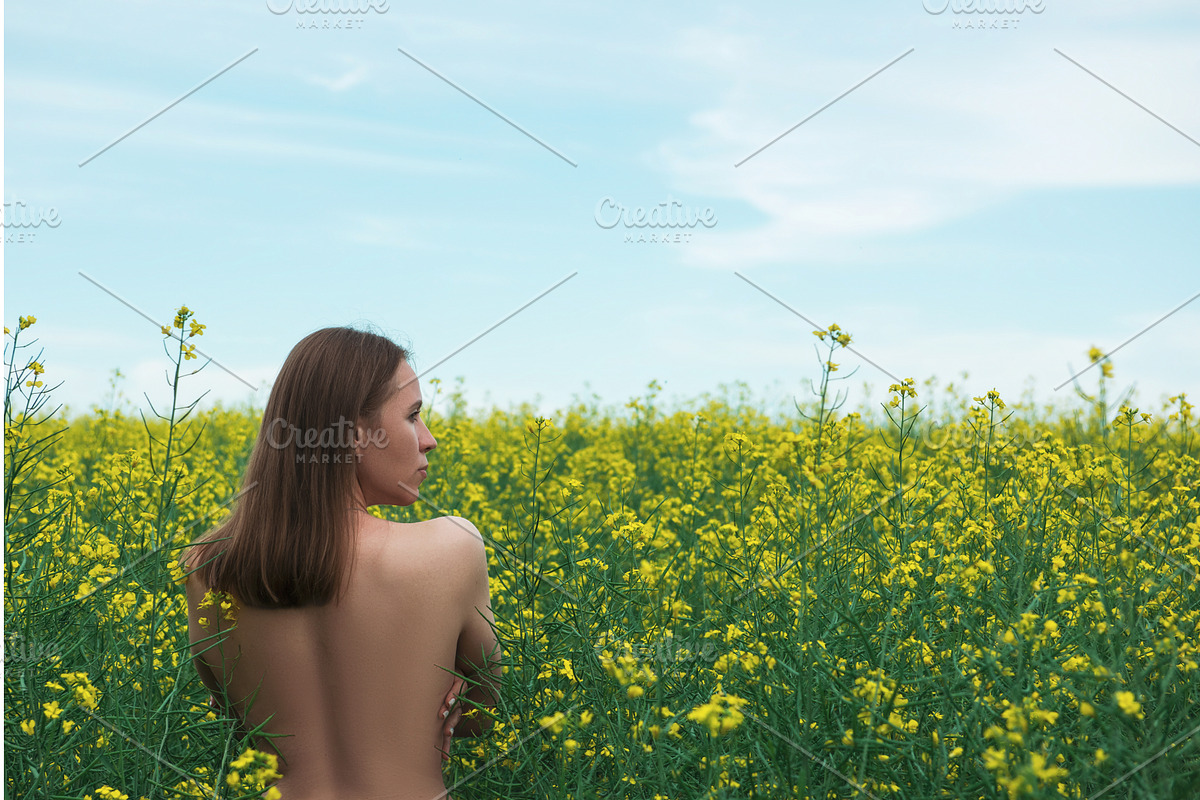 Woman in Yellow Flower Field, a Graphic by Jan Jack Russo Media