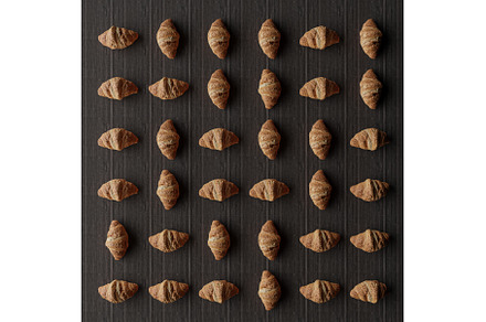 Fresh baked croissants pattern rows