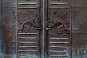 Two lions carved on iron and wooden, an Abstract Photo by Imaginarium