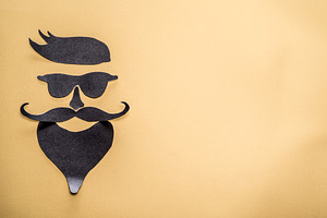 Hipster's definicial facial look cut from paper.