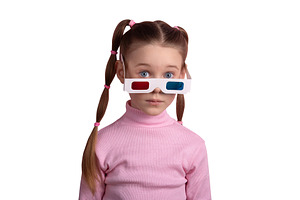 Young girl with pigtails in a pink turtleneck and 3D glasses, lo, a Person Photo by Ales Munt