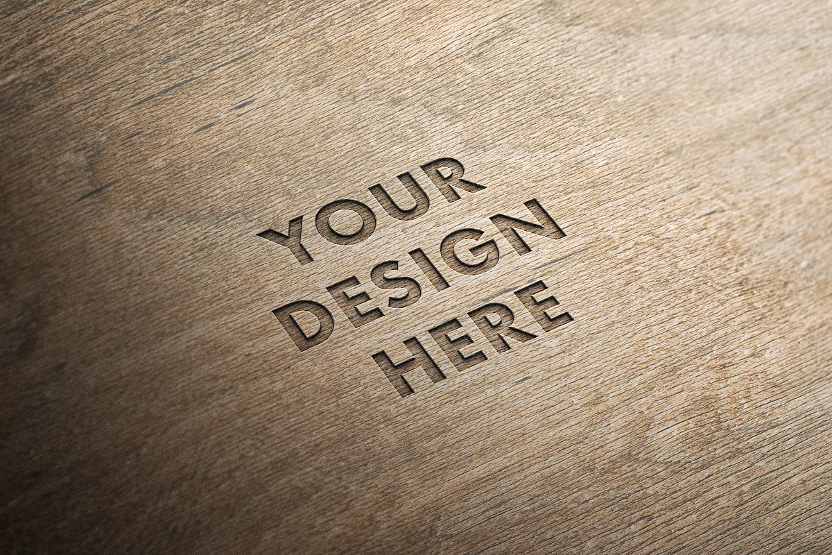 Woodcut Logo Mockup, a Product Mockup by Design Squad (Photo 5 of 5)