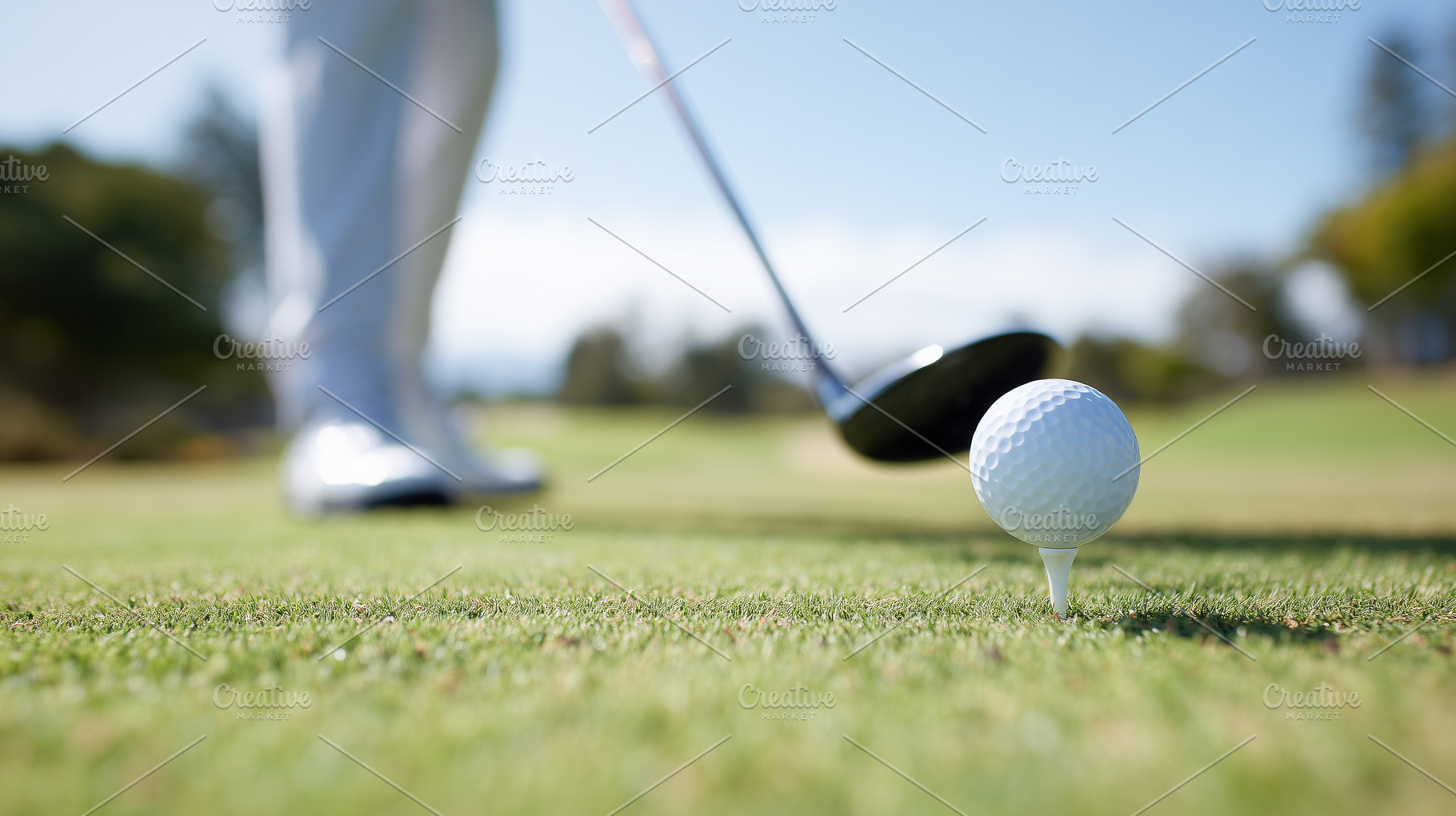 Close up of a golf ball on a tee as, a Sports & Recreation Photo by MistyDay