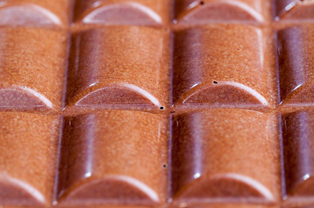 air milk chocolate broken into pieces, a Background Photo by MyPhotos