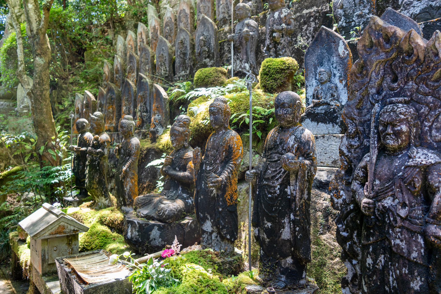 Buddhist statue group at Mitaki-Dera temple in Hiroshima, Japan, an ...