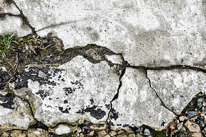 cracked concrete surface with deep, a Background Photo by Apolonia