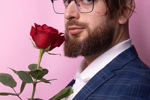 Man with Rose on Pink Background, a Person Photo by Ales Munt
