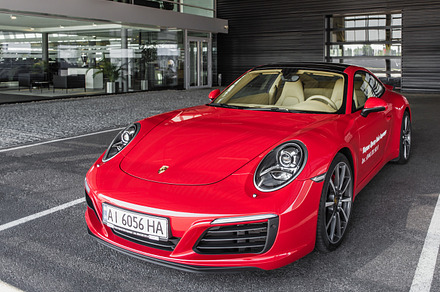Red porsche 911 stock photo containing porsche and 911, a Transportation Photo by SvyatStudio