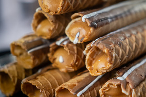 Waffles tube crispy cream cookie stacked pile, a Food & Drink Photo by Photo Drive Studio