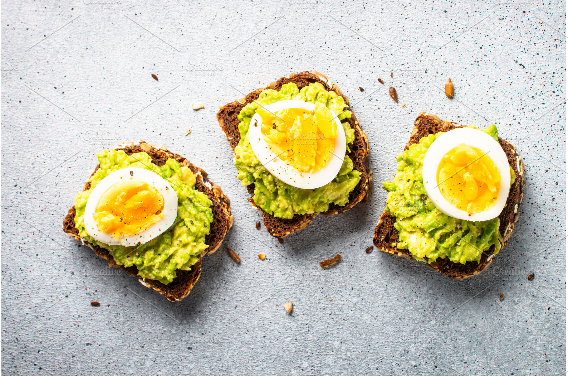 Whole grain bread with avocado and, a Food & Drink Photo by Nadia-nb