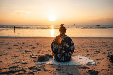Summer sunset,Woman sitting on the beach watching the sunset, a Nature Photo by Art Rachen