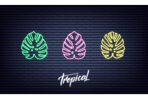 Tropical neon palm leaves. Glowing sign of monstera exotic leaves