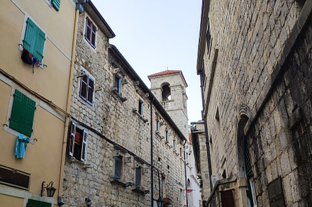 Beautiful narrow street with lantern, an Architecture Photo by Photo by YuraYaryna