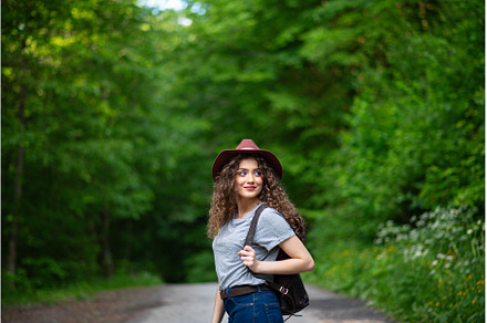 Young tourist woman traveller with, a Person Photo by HalfPoint