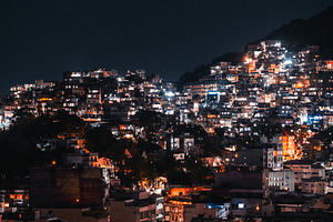 Rio hillside, favela lights at night, an Architecture Photo by SkyNext