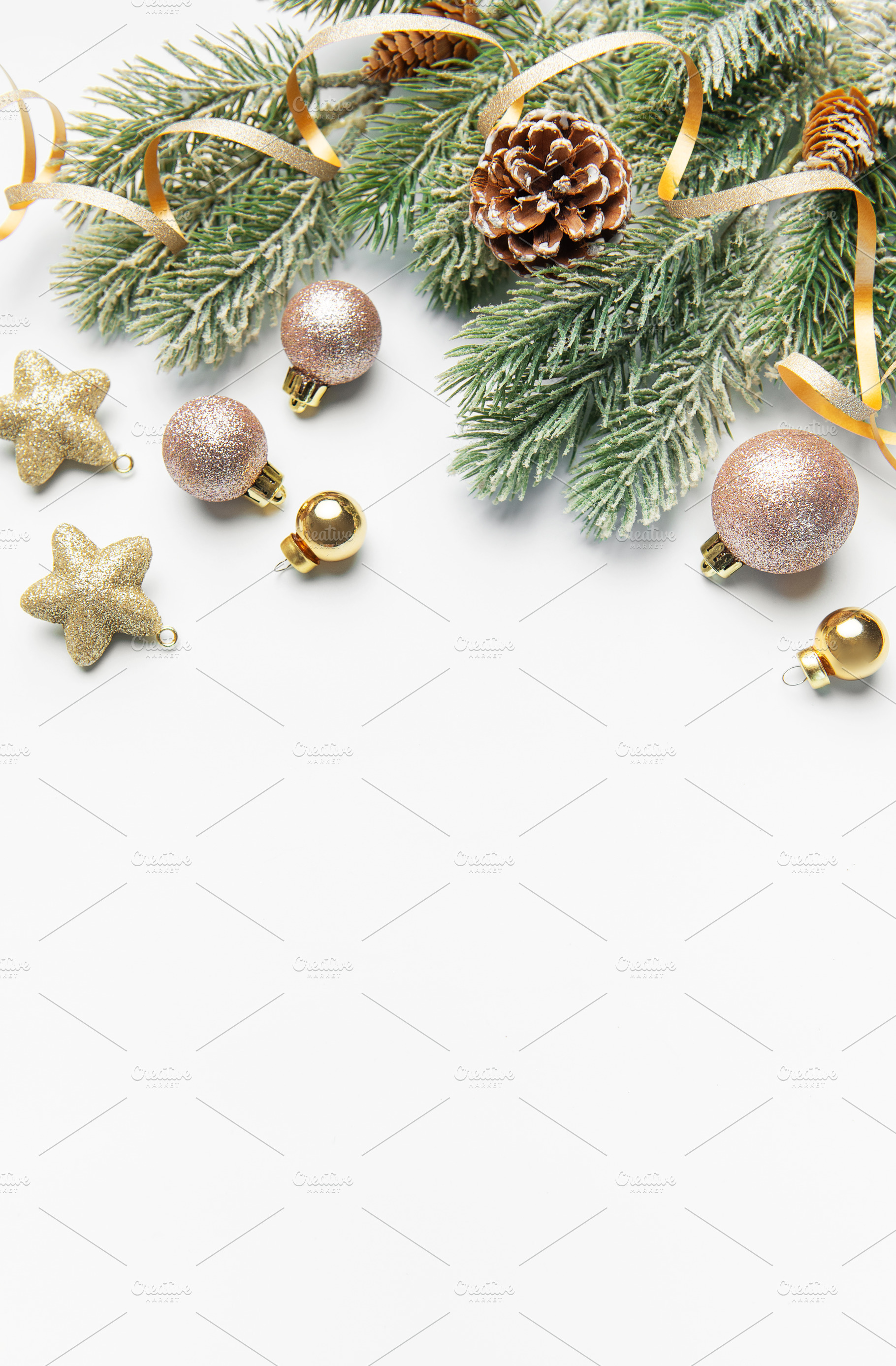 Christmas tree branch decorated with festive ornaments, pinecone, a Holiday Photo by Olena Rudo
